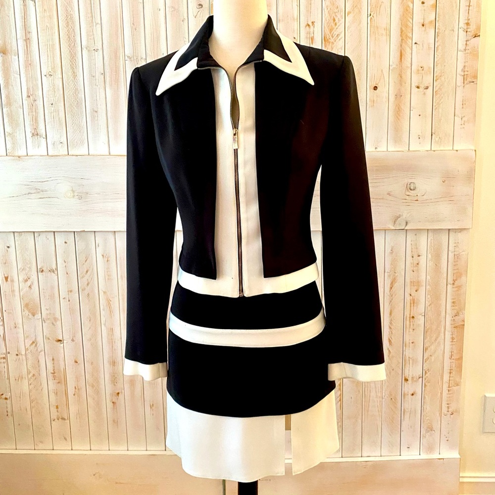 Managance skirt suit. Made in Paris! No flaws to note, pristine condition.